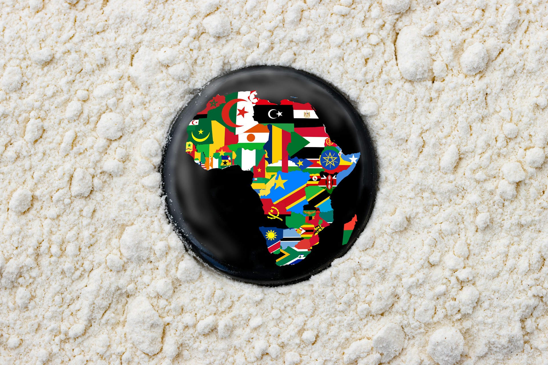 Daily travel budget breakdown for Africa planning with notebook and map