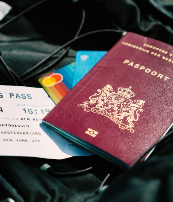 International travel documents checklist 2026 with passport and boarding pass on airport table